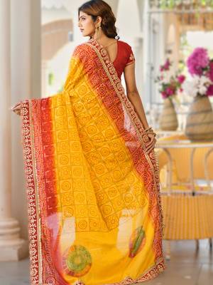  yellow fancy print bandhani saree moss chiffon with work blouse 2