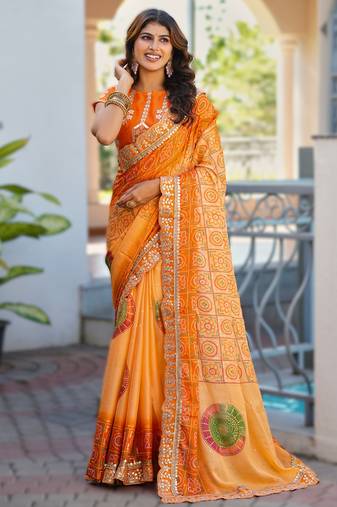  orange fancy print bandhani saree  heavy moss chiffon with heavy work blouse