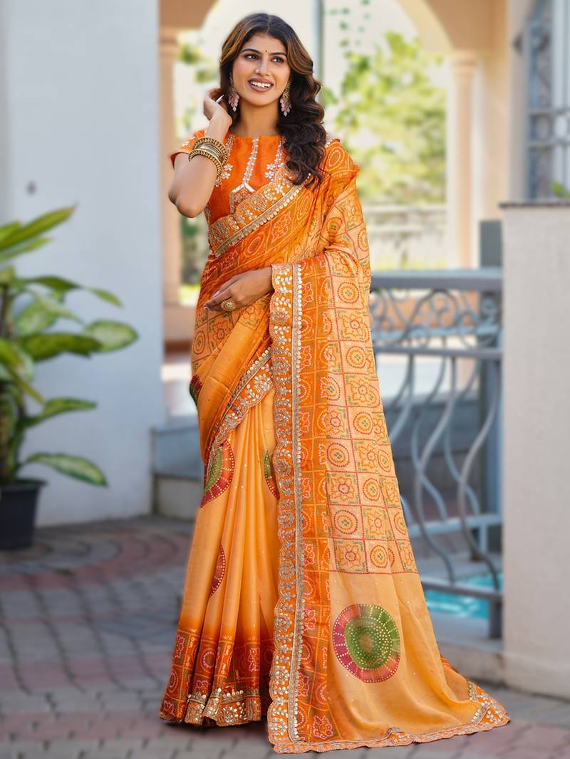  orange fancy print bandhani saree  heavy moss chiffon with heavy work blouse