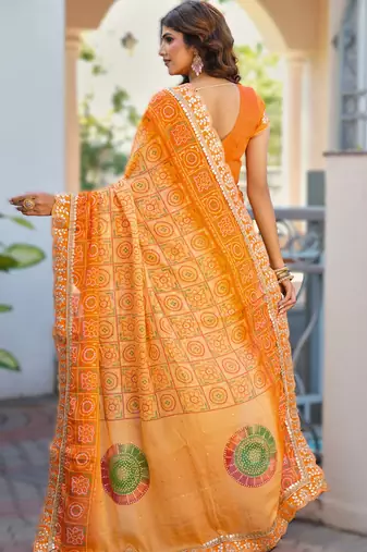  orange fancy print bandhani saree moss chiffon with work blouse