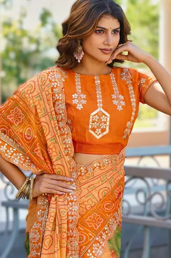  orange fancy print bandhani saree moss chiffon with work blouse