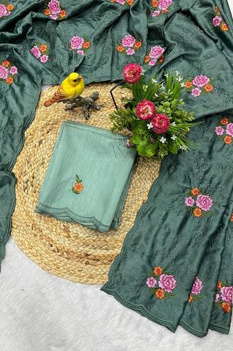 sea green silk saree with multi-thread cutwork designs