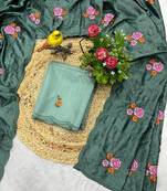 sea green silk saree with multi-thread cutwork designs