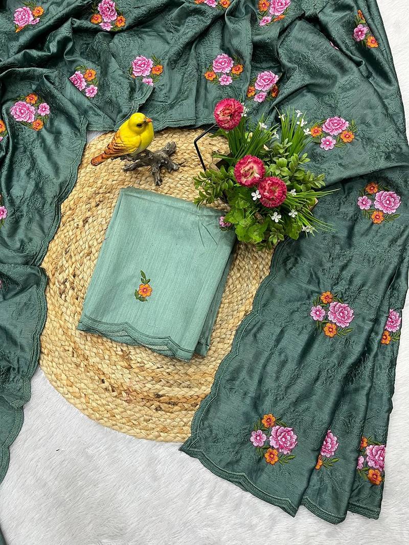 sea green silk saree with multi-thread cutwork designs