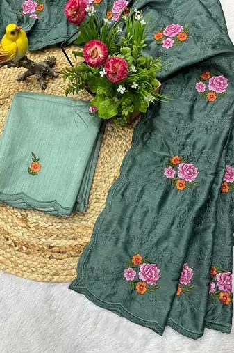 sea green silk saree with multi-thread cutwork designs