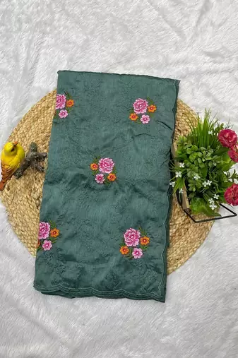 sea green silk saree with multi-thread cutwork designs