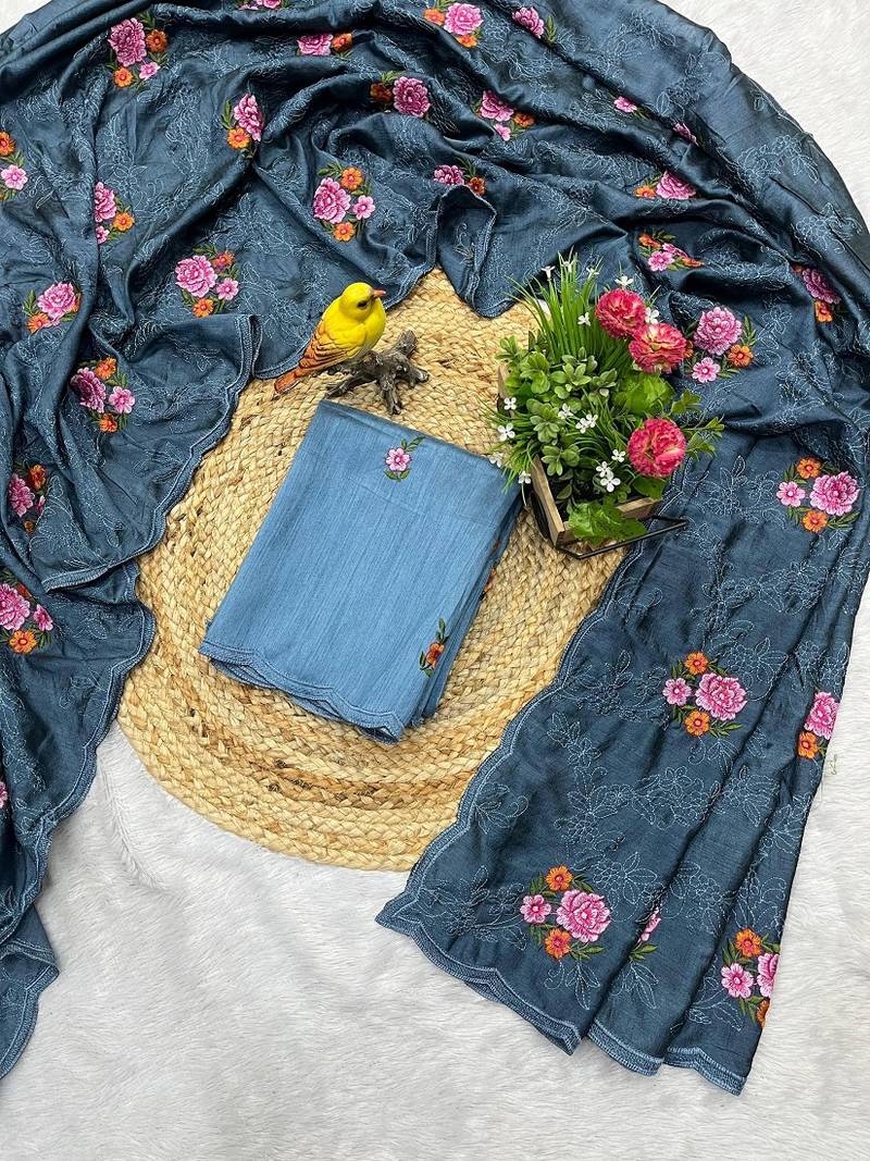 teal blue silk saree with multi-thread cutwork designs