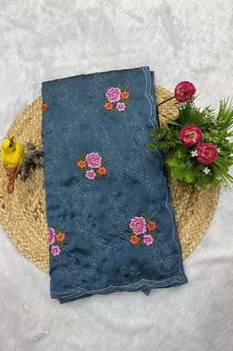 teal blue silk saree with multi-thread cutwork designs