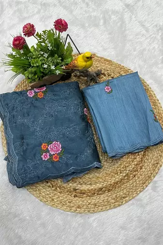 teal blue silk saree with multi-thread cutwork designs