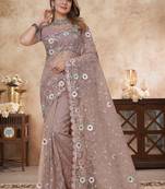 beige net saree with resham embroidery