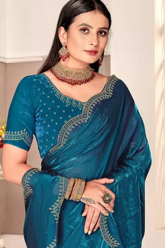 teal blue silk saree with zarkan border work