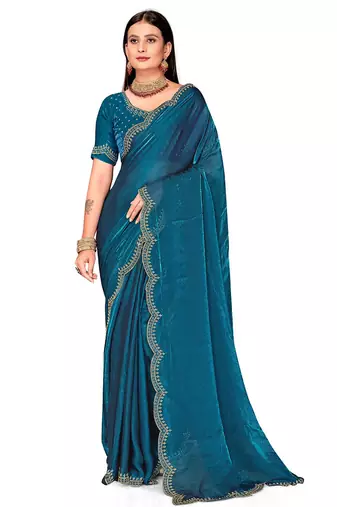 teal blue silk saree with zarkan border work