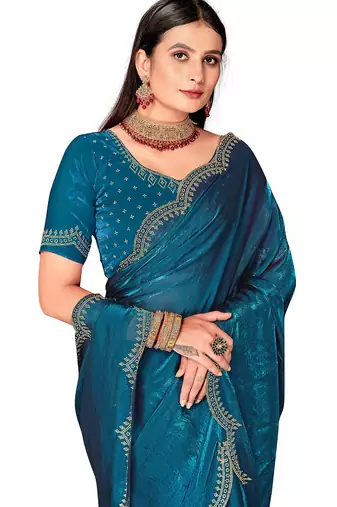 teal blue silk saree with zarkan border work