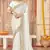 white silk saree with zari sirovski embroidery