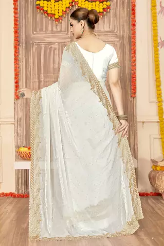 white silk saree with zari sirovski embroidery