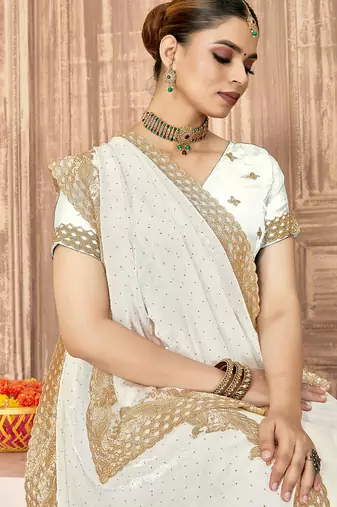 white silk saree with zari sirovski embroidery
