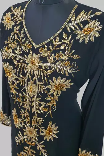 Elegant black georgette kaftan gown with golden zari work With hijab.
