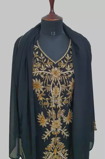 Elegant black georgette kaftan gown with golden zari work With hijab.