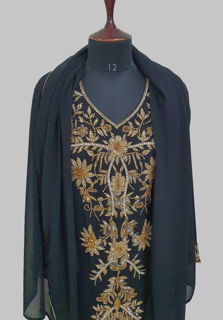 Elegant black georgette kaftan gown with golden zari work With hijab.