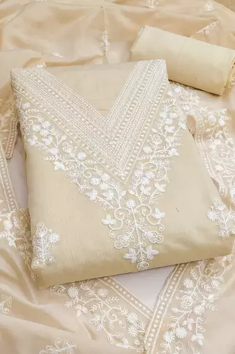  beige heavy embroidery cotton dress material 