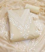  beige heavy embroidery cotton dress material 