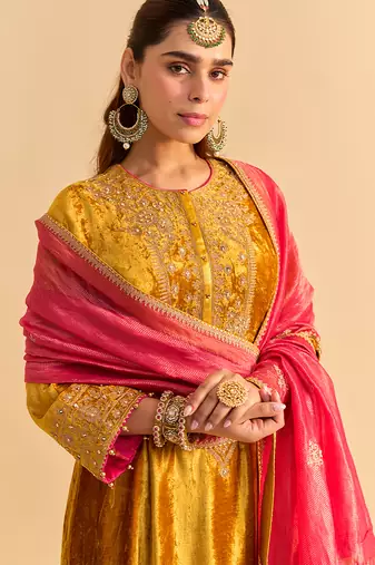 Yellow embroidered velvet kurta set with dupatta