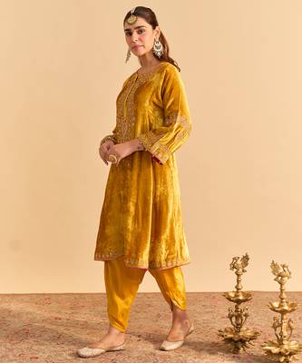 Yellow embroidered velvet kurta set with dupatta 1
