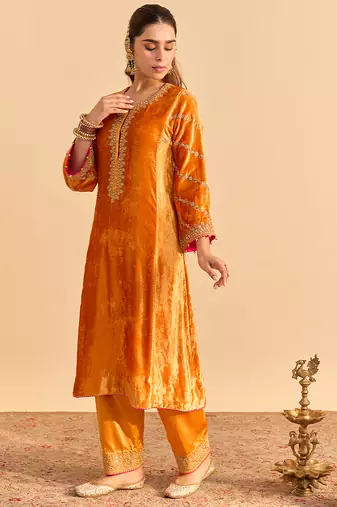 Orange embroidered velvet kurta set