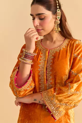 Orange embroidered velvet kurta set