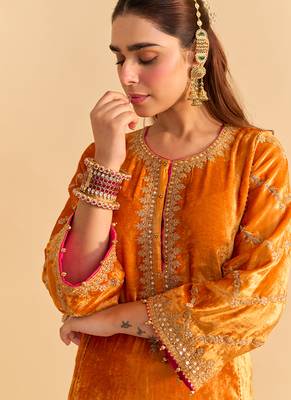 Orange embroidered velvet kurta set with dupatta 3