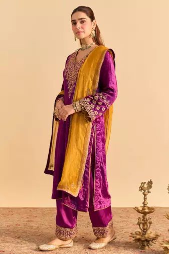 Purple embroidered velvet kurta set with dupatta