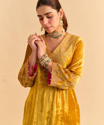 Yellow embroidered velvet kurta set with dupatta 3