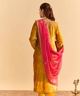 Yellow embroidered velvet kurta set with dupatta 5