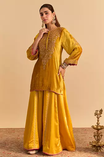 Yellow embroidered velvet sharara set with dupatta