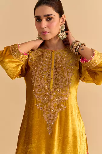 Yellow embroidered velvet sharara set with dupatta