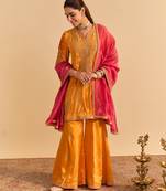 Orange embroidered velvet sharara set with dupatta