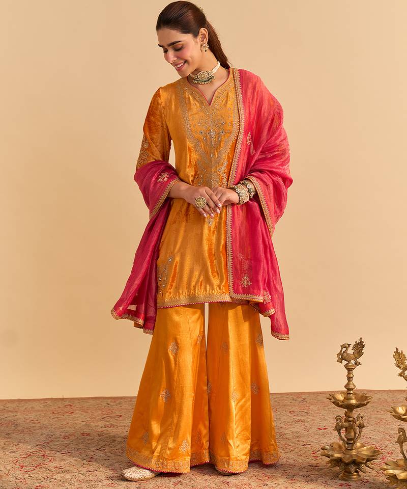 Orange embroidered velvet sharara set with dupatta