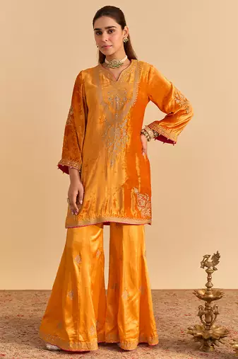Orange embroidered velvet sharara set with dupatta