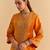 Orange embroidered velvet sharara set with dupatta
