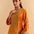 Orange embroidered velvet sharara set with dupatta