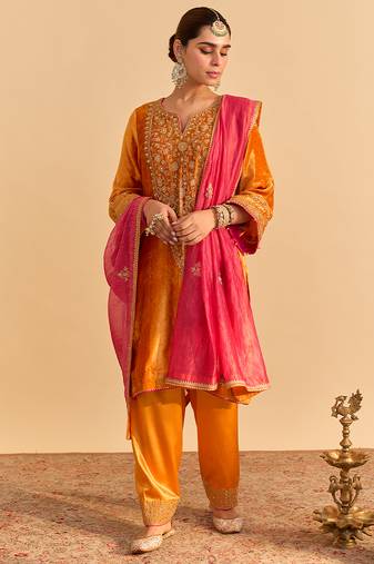 Orange embroidered velvet kurta set with dupatta