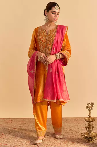 Orange embroidered velvet kurta set with dupatta