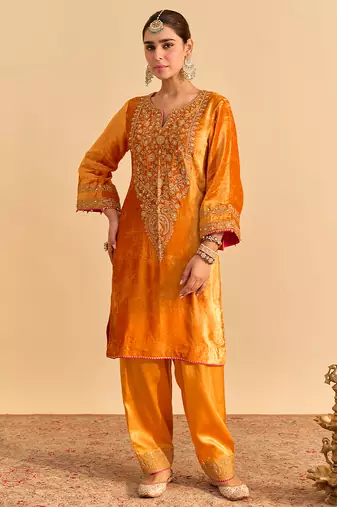 Orange embroidered velvet kurta set with dupatta