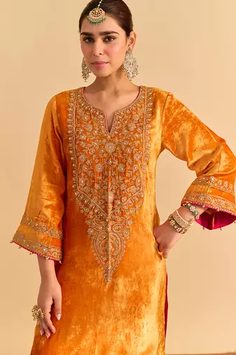 Orange embroidered velvet kurta set with dupatta