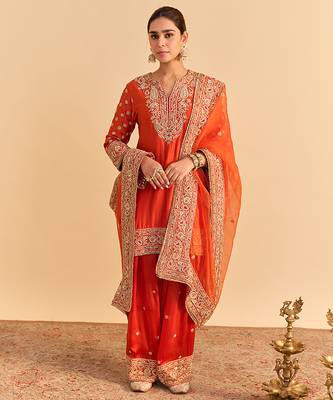 Orange embroidered silk kurta set with dupatta 1