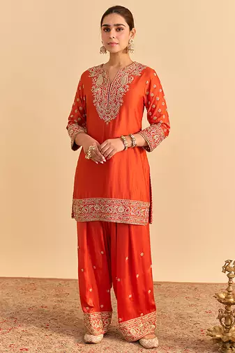Orange embroidered silk kurta set with dupatta