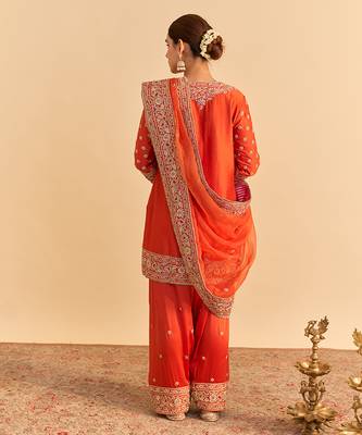 Orange embroidered silk kurta set with dupatta 5