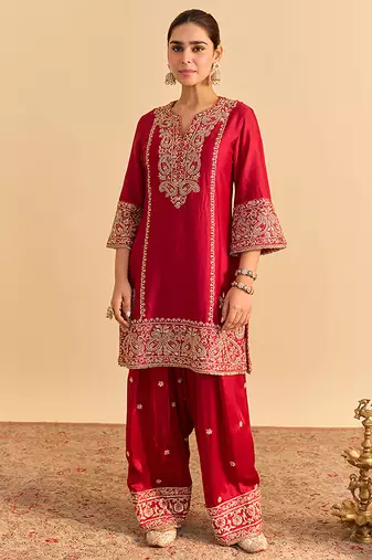 Red embroidered silk kurta set with dupatta