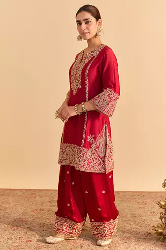 Red embroidered silk kurta set with dupatta
