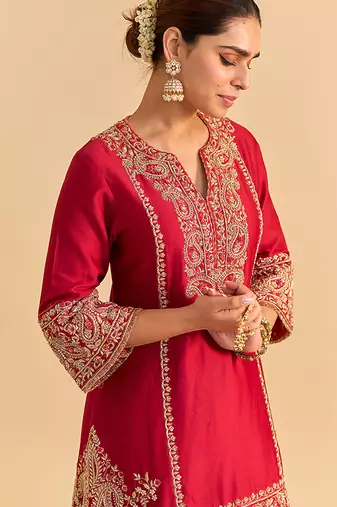 Red embroidered silk kurta set with dupatta